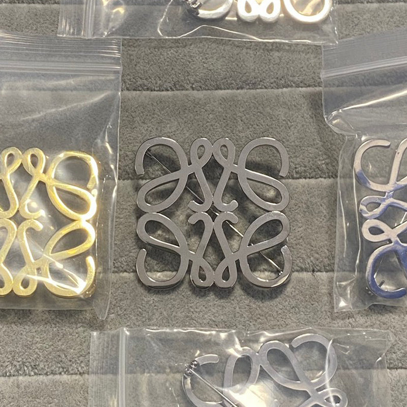 18K Loe Anagram White Gold Brooch