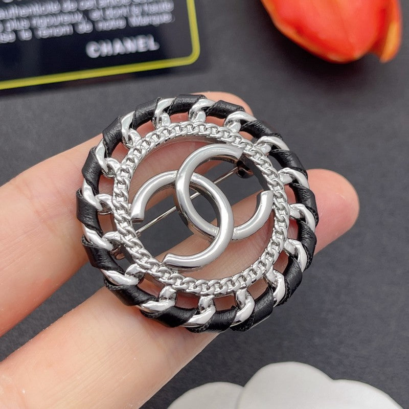 CC Leather Gold Brooch