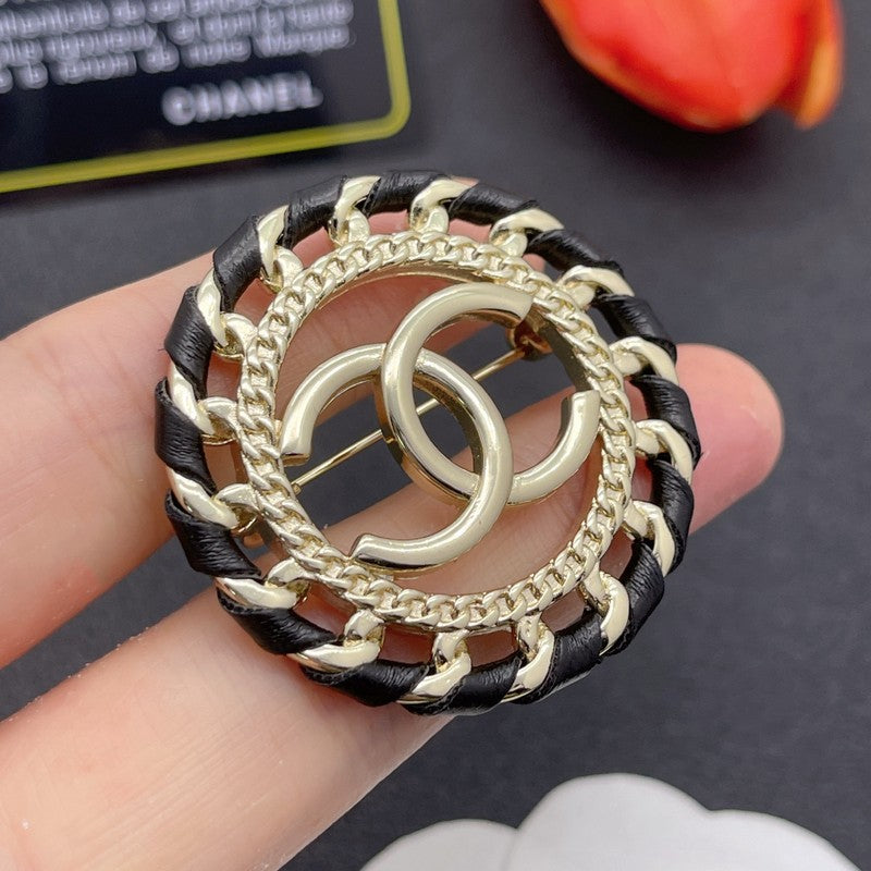 CC Leather Gold Brooch