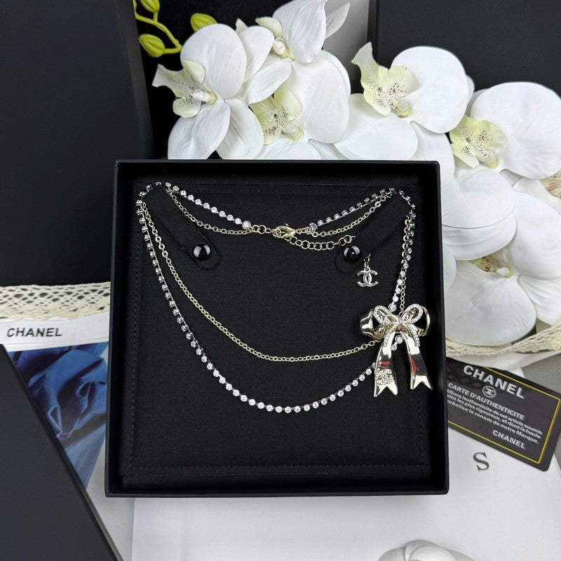 CC 25K Bow Tie Diamond Gold Necklace