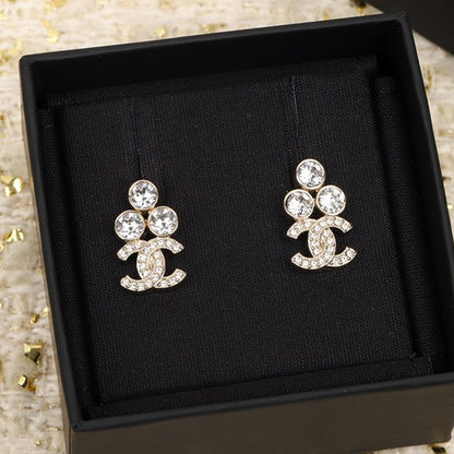 CC 23C Three Diamond Earrings
