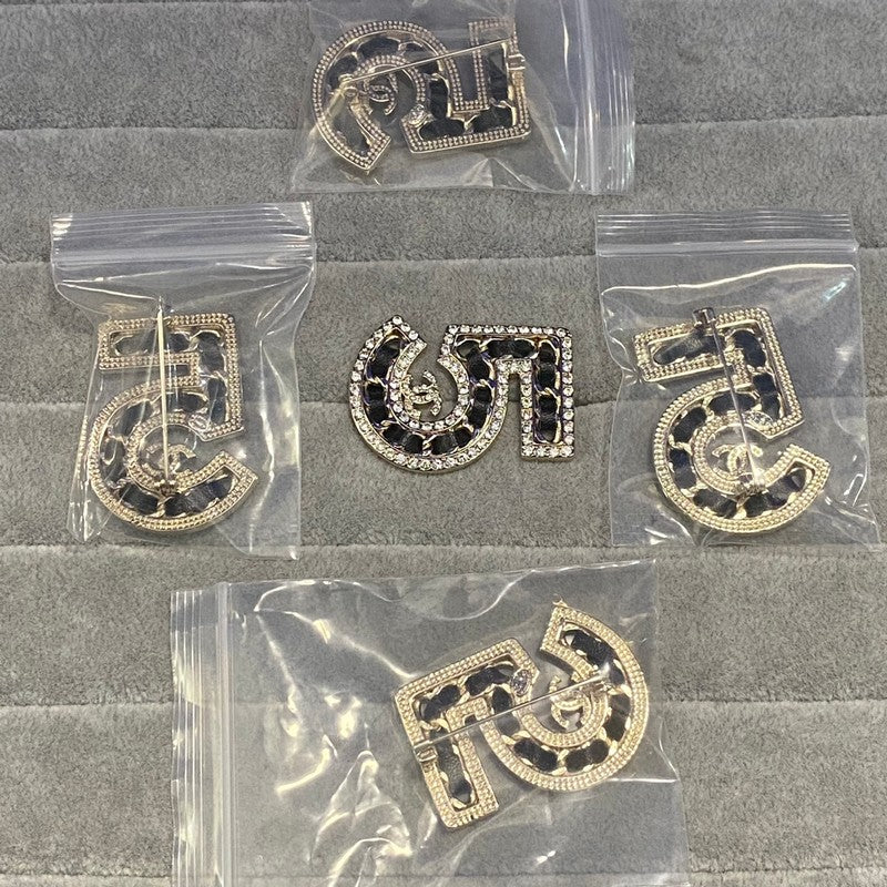 18K CC NO.5 Black Leather Diamond Brooch