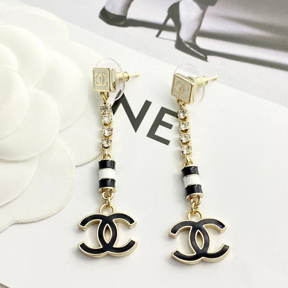 CC 24C Black Gold Tassel Earrings