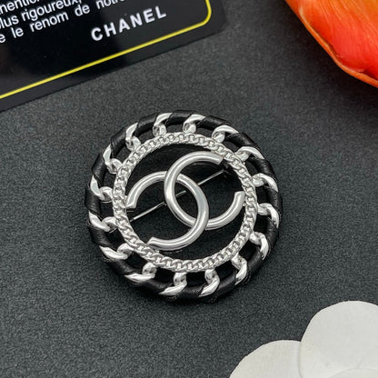 CC Leather Gold Brooch