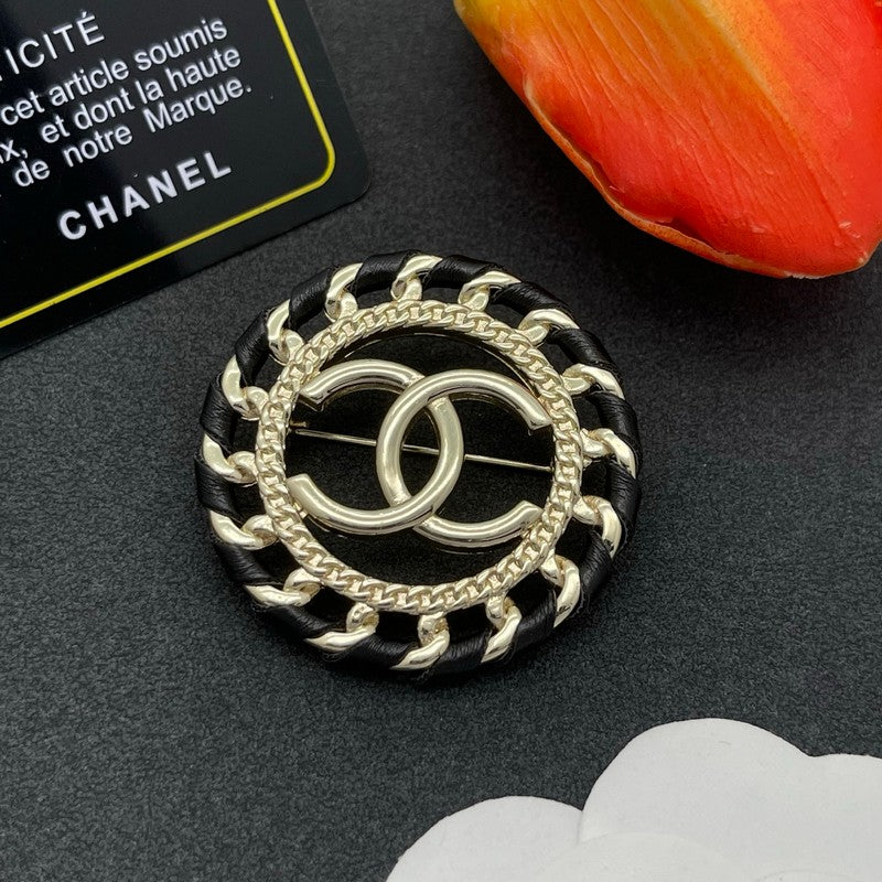 CC Leather Gold Brooch