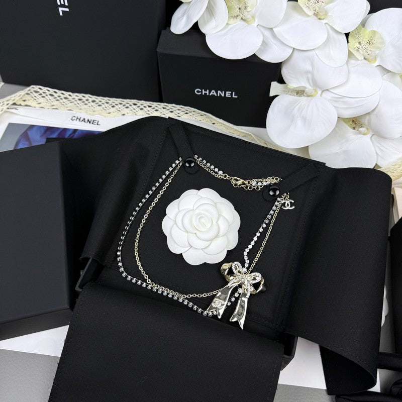 CC 25K Bow Tie Diamond Gold Necklace