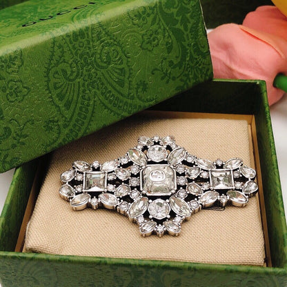 GG Crystal Horse Eye Brooch