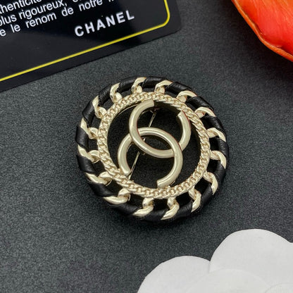 CC Leather Gold Brooch