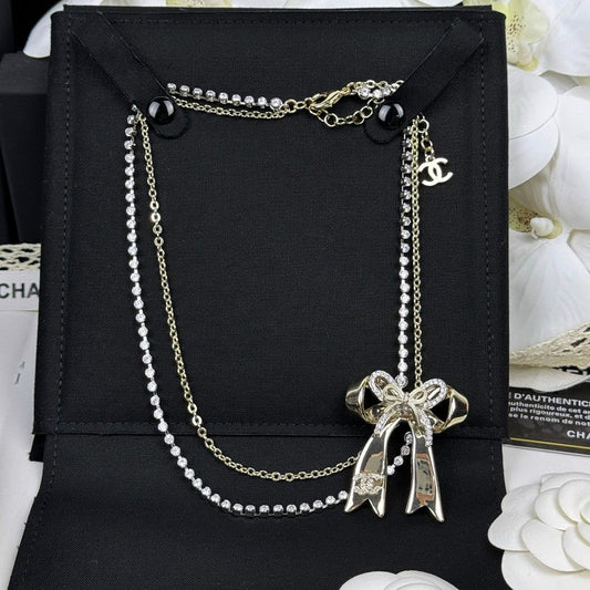 18K CC 25K Bow Tie Diamond Gold Necklace