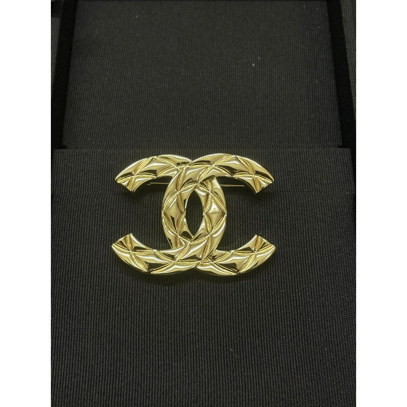 CC Pattern Gold Brooch