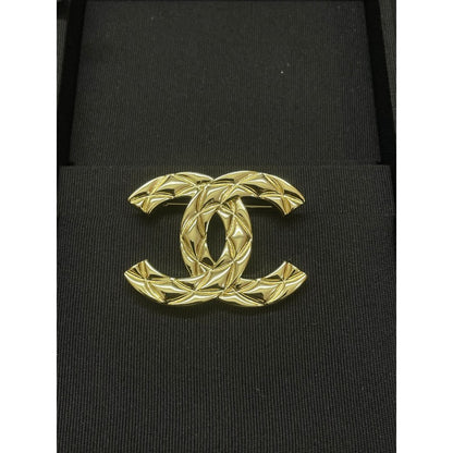 CC Pattern Gold Brooch