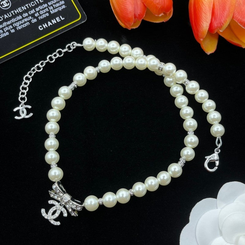 CC Bow Tie Pearls Necklace