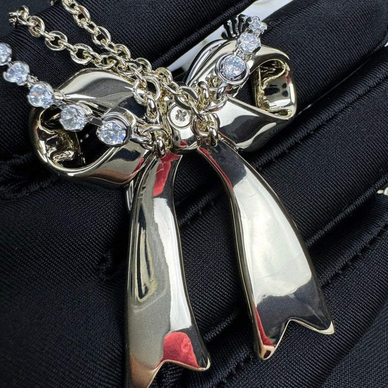 CC 25K Bow Tie Diamond Gold Necklace