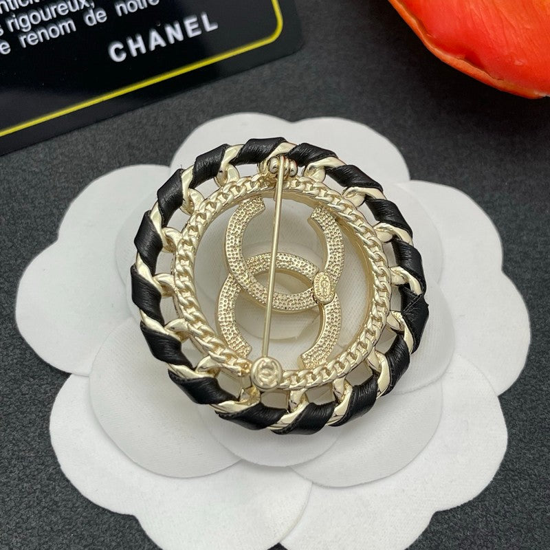 CC Leather Gold Brooch