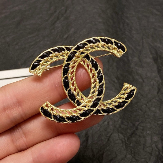 CC Leather Gold Brooch