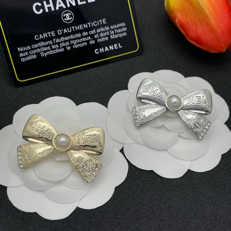 CC Bow Tie Gold Brooch